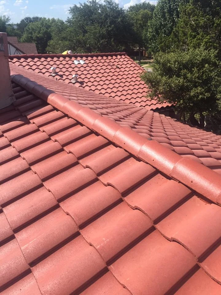 Red roof tiles and rounded caps, from the company’s Fort Worth tile-roof album.