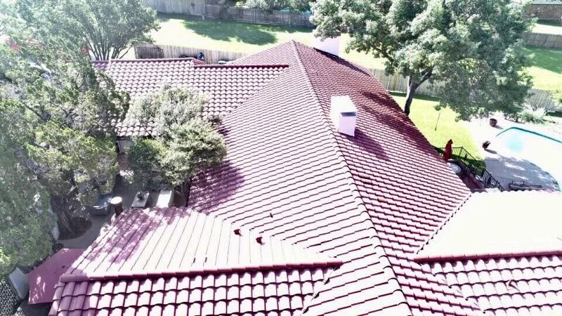 An elevated view of intersecting tile-roof planes in the Peaked photo archive.