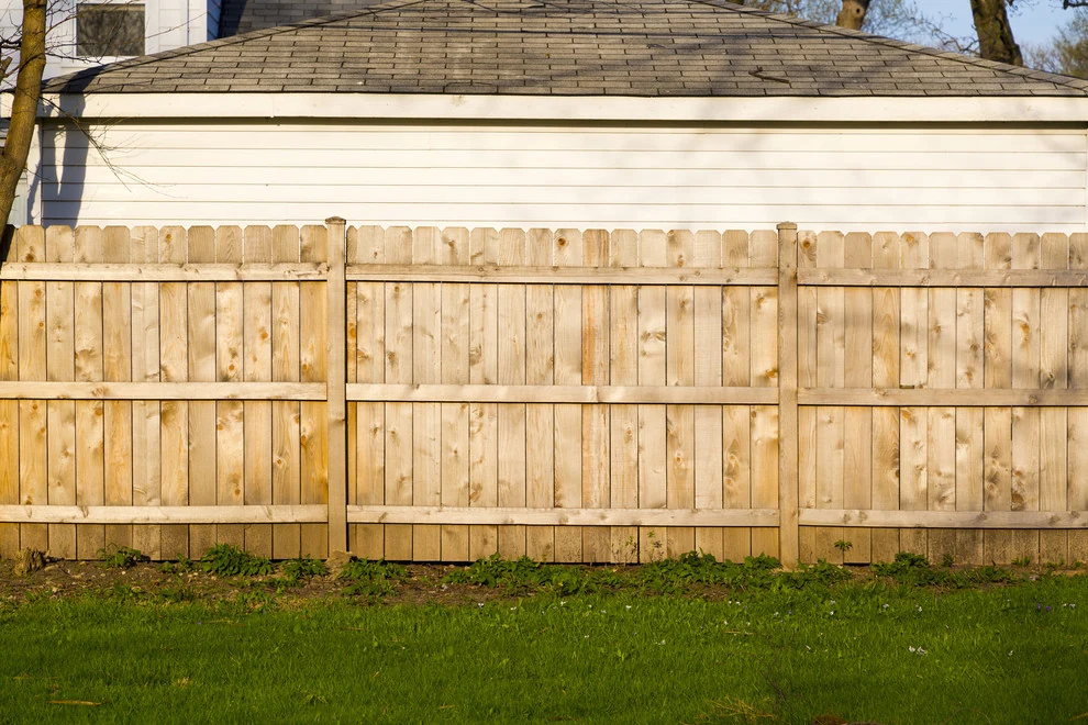 A wood-fence installation published in Peaked’s Fort Worth project album.